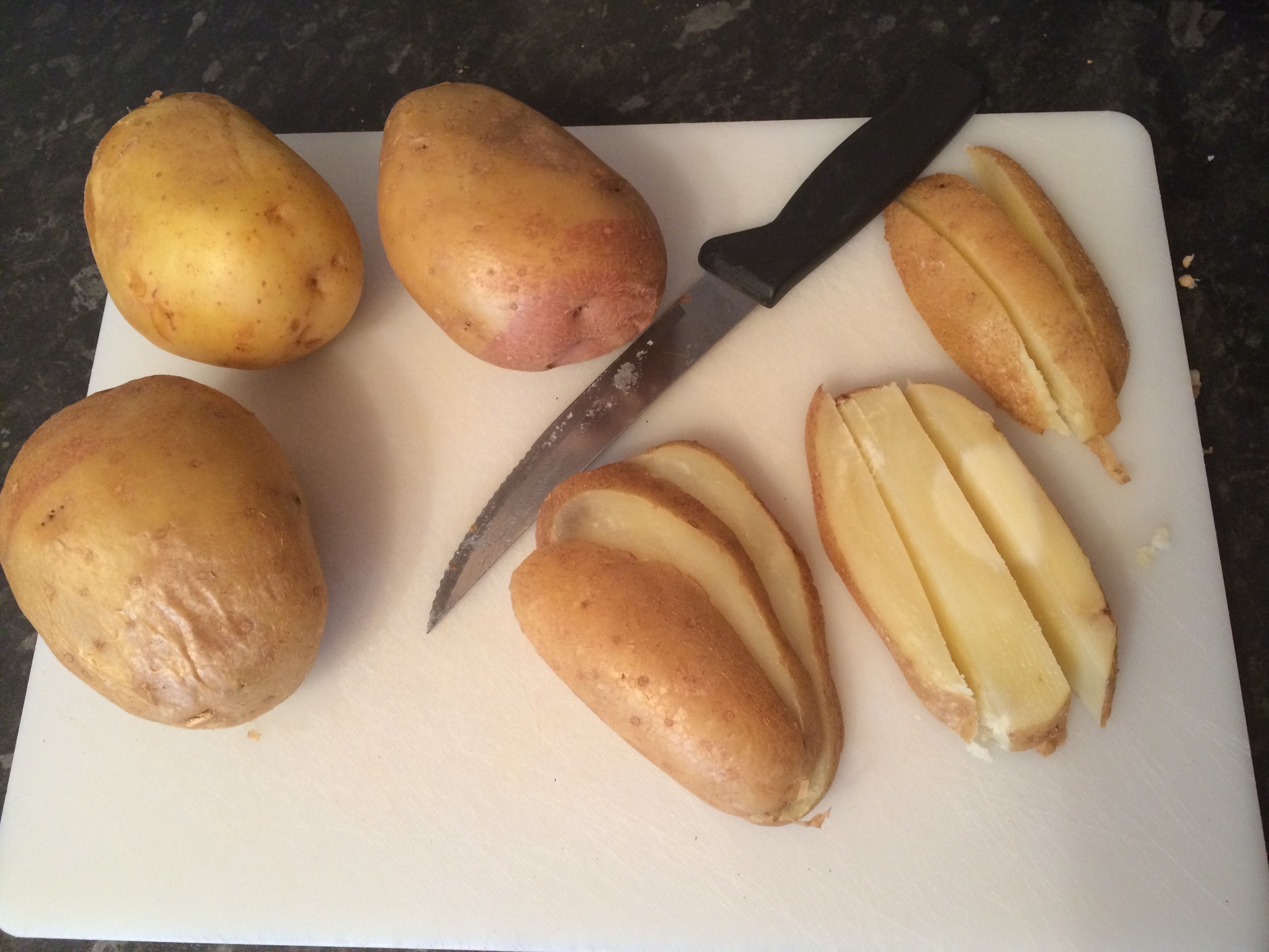 When they come out and you can handle them (although I'm too impatient to wait) slice them thickly and cut into chips