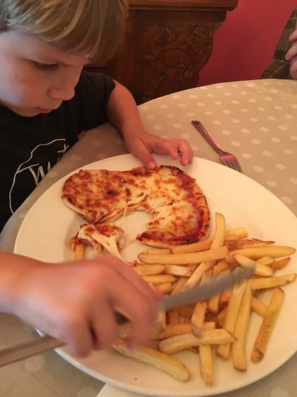 He loved the naan bread pizza at Moonfleet Manor, but struggled with the dining room