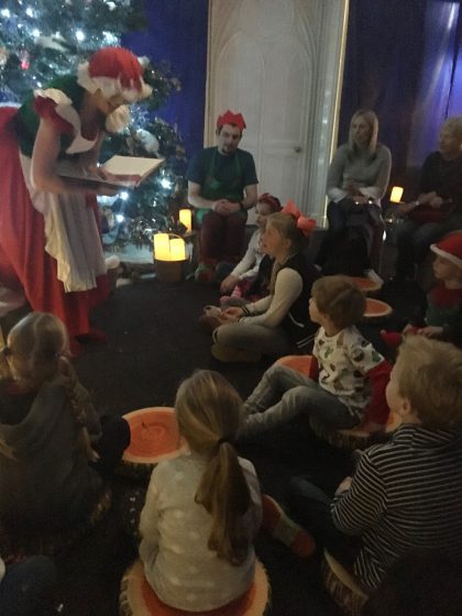 You're not seeing things. Thats Oscar. Sat on a carpet. with other children. Listening to a story. Regardless of how long that lasted it happened and I couldn't have been prouder. The fact that Mrs Claus was wonderful and read such a cute story may have helped!